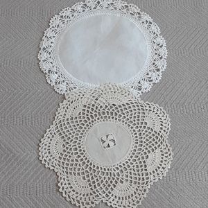 Pair of vintage round crocheted doilies.